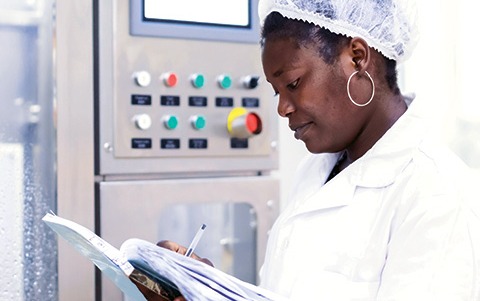 worker at a dairy plant